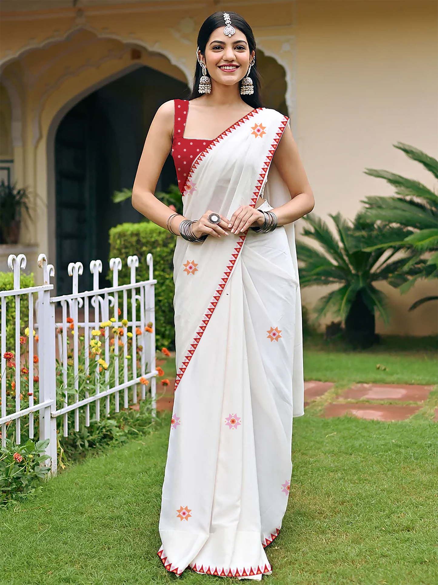 Woman wearing Zohra White saree, handcrafted mul cotton saree with subtle block prints by Shayora
